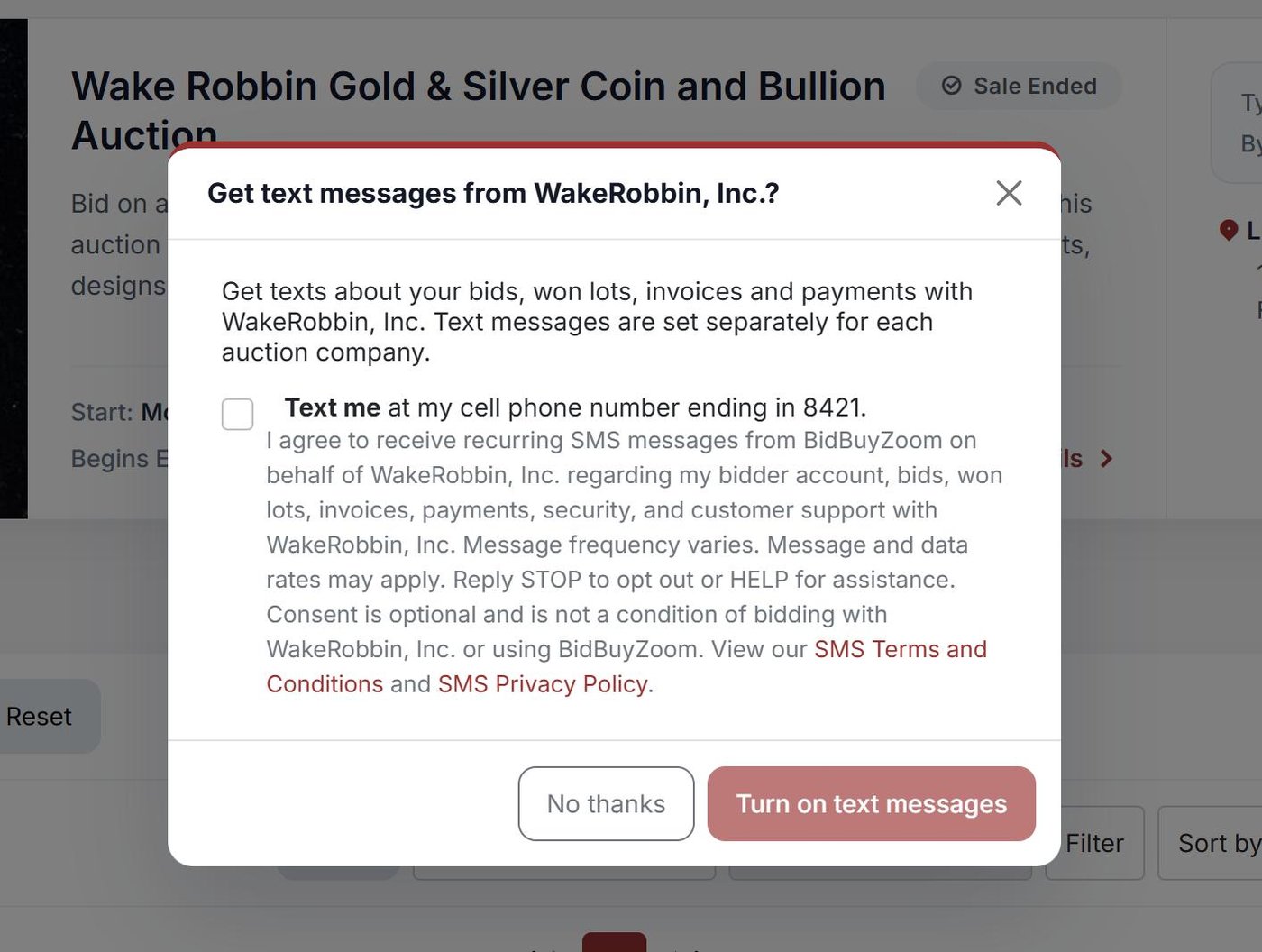 One-time question on an auction company’s BidBuyZoom site asking whether to get text messages from that auction company, with the consent language, an unchecked checkbox, a Turn on text messages button and a No thanks button